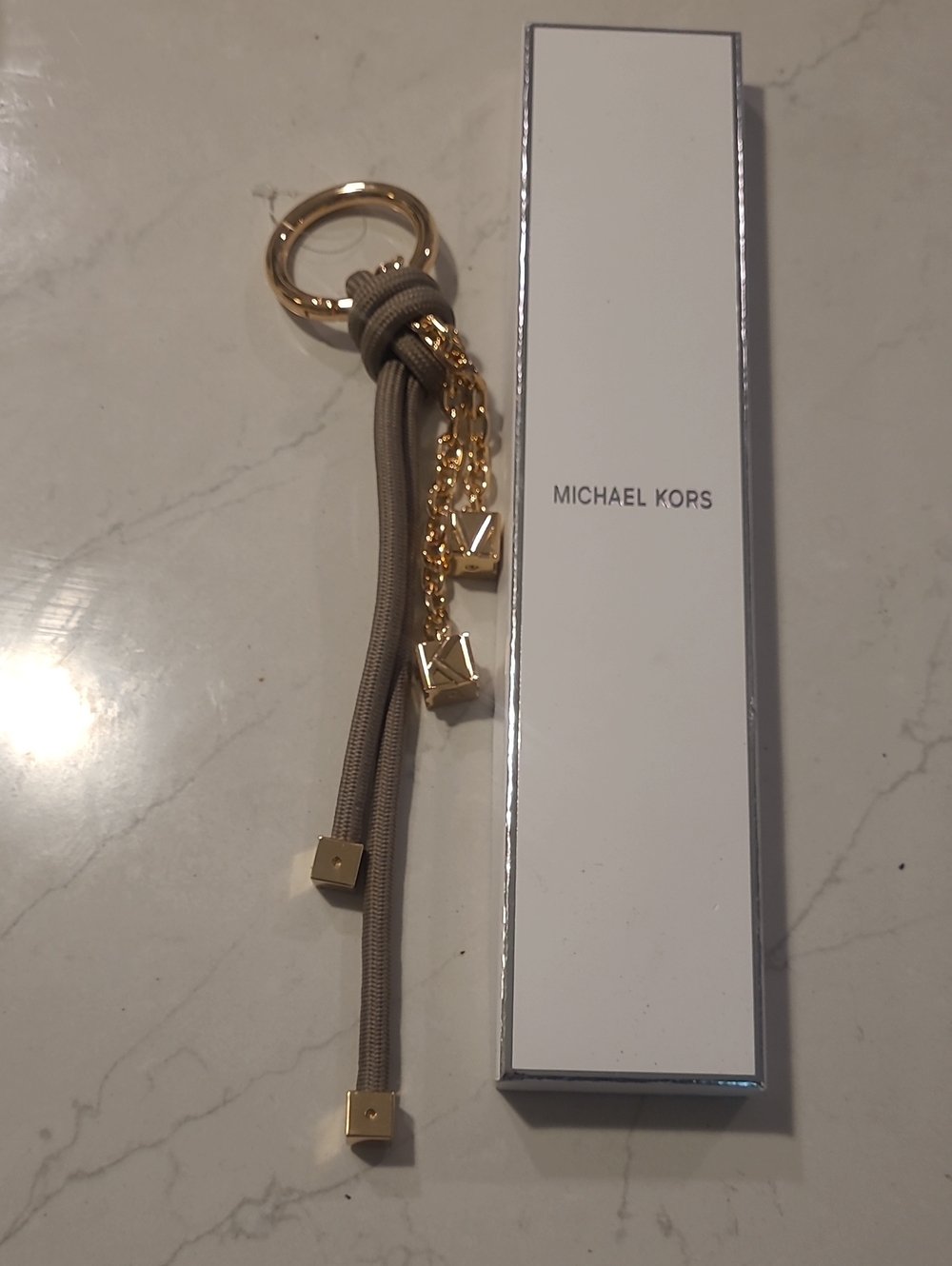 Michael Kors Taupe and Gold Charm Keychain